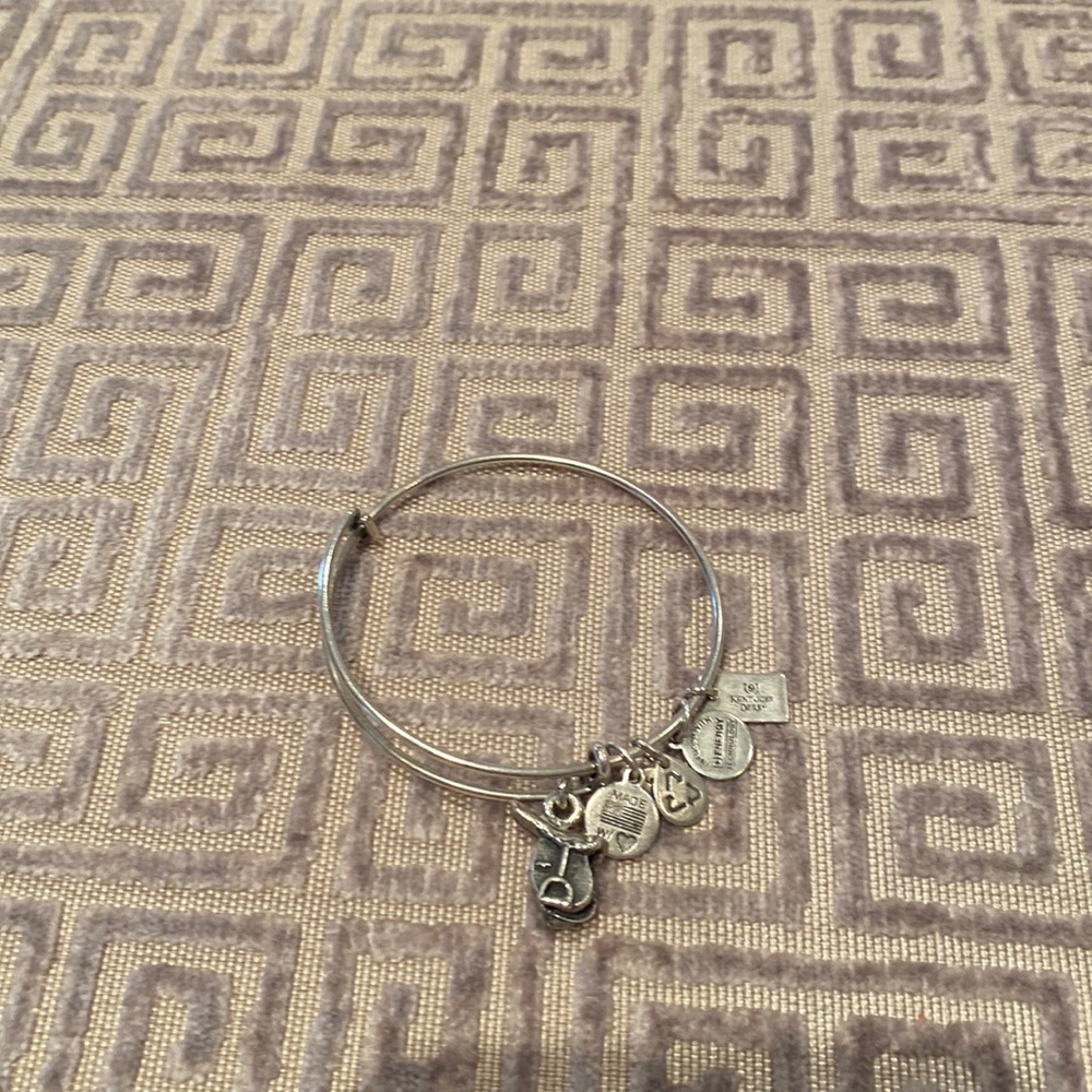 Alex and Ani kids bracelet with saddle charm